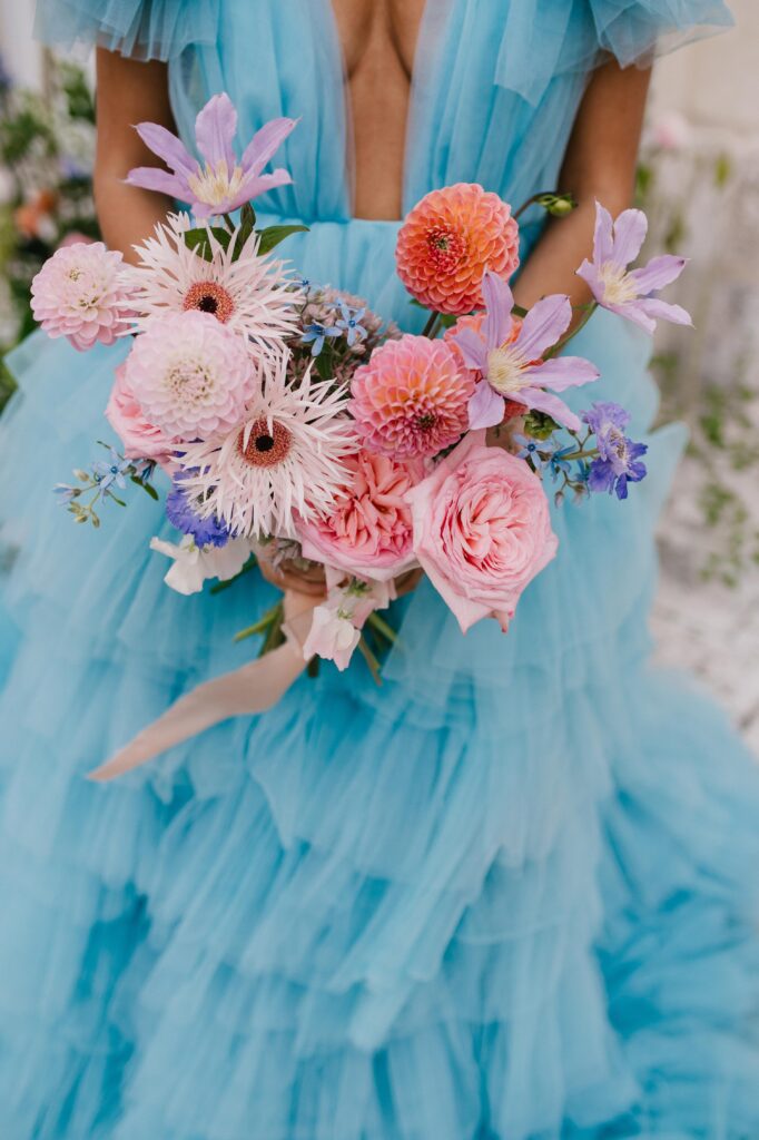 Colourful bridal bouquet by blooms fair. 
