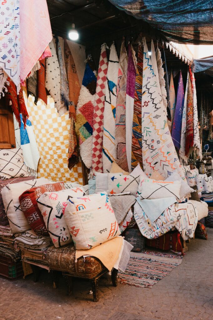 Cushions, carpets and rugs in Marrakech Souk Medina.