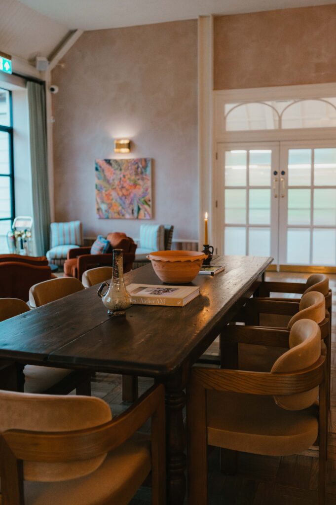 Close-up of the whitewashed timber lodge exterior at Limekiln with a modern architectural twist.